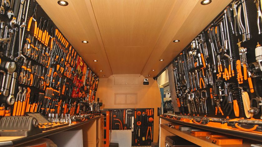 tradesmen tools organised in a van on side walls